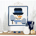 The completed January project featuring a snowman wearing a hat, gloves, and scarf, hung on a craft holder and staged on a wooden table with coordinating spools and holiday décor.