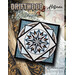 Cover of Driftwood Beach quilt pattern featuring a geometric floral design in blues and browns.