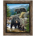 Panel fabric featuring a majestic wilderness with bears and cubs enjoying a flowing stream set inside of a wooden picture frame.