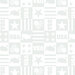 A grey on white on white fabric featuring blocks of patriotic themes of stars, stripes, maps, and hearts.