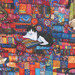 8x8 swatch of the fabric featuring layers of brightly colored textiles with sleeping cats.