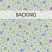 A gray fabric with a floral pattern of blue, teal, and purple roses with green vines. A banner at the top reads backing.
