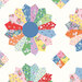 Cloud white fabric with a cheater quilt pattern featuring patterns from the collection