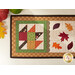 A top down shot of the patchwork leaf, showing fabric and stitching details.