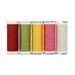 Five spools of thread next to each other, isolated on a white background.
