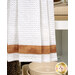 A close up of the bottom of the hanging towel, showing a decorative strip of brown mottled fabric and the white towel fabric. 