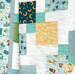A close up image of the quilt, demonstrating fabric colors and print details as well as top quilting effects.