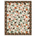 The finished Playing Favorites Quilt in cream, cottage green, brown, and orange isolated on a white background.