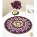 The completed Folded Star Table Topper, colored in purple, tan, and green fabrics from the Collection for a Cause - Essence series from Moda Fabrics, staged on a white table with coordinating flowers.