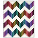 The colorful Ridiculously Easy Jelly Roll Quilt colored in bold fabrics from the Moody Hues collection, isolated on a white background. 