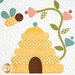 A close up shot of a quilt block featuring a honey bee and a bee hive with a abstract flower . 