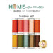 Ten spools of thread in red, pink, peach, orange, yellow green, blue and brown, underneath a text graphic that reads "Home in the Middle Block of the Month - Thread Set."
