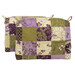 The two completed Mini-Charm Bags, colored in elegant green and purple fabrics from the Collection for a Cause: Essence collection by Moda Fabrics, isolated on a white background. 