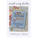 The front of the Victory in Jesus cross stitch pattern, showing the completed project with coordinating décor.