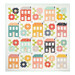 The completed Spring Town Quilt colored in vibrant fabrics from the Delightfully Yours collection by Moda Fabrics, isolated on a white background.