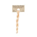 A skein of pale peach embroidery floss, twisted and bundled, with a tan label featuring the brand name and color information.