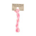 A skein of pink and cream embroidery floss, twisted and bundled, with a tan label featuring the brand name and color information.