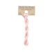 A skein of dusty rose pink embroidery floss, twisted and bundled, with a tan label featuring the brand name and color information.