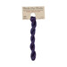 A skein of royal purple and blue embroidery floss, twisted and bundled, with a tan label featuring the brand name and color information.
