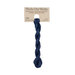 A skein of navy blue embroidery floss, twisted and bundled, with a tan label featuring the brand name and color information.?