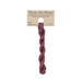 A skein of tonal pink-red embroidery floss, twisted and bundled, with a tan label featuring the brand name and color information.