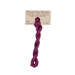 A skein of variegated pink and purple embroidery floss, twisted and bundled, with a tan label featuring the brand name and color information.