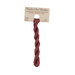 A skein of brick red embroidery floss, twisted and bundled, with a tan label featuring the brand name and color information.