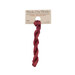A skein of warm red embroidery floss, twisted and bundled, with a tan label featuring the brand name and color information.