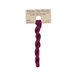 A skein of Dark Magenta embroidery floss, twisted and bundled, with a tan label featuring the brand name and color information.