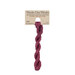 A skein of muted boysenberry red embroidery floss, twisted and bundled, with a tan label featuring the brand name and color information.