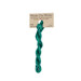 A skein of bright viridian embroidery floss, twisted and bundled, with a tan label featuring the brand name and color information.