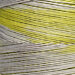 A variegated chartreuse and gray swatch of Weeks Dye Works floss.