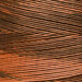 A variegated copper and brown swatch of Weeks Dye Works floss.