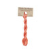A skein of salmon orange embroidery floss, twisted and bundled, with a tan label featuring the brand name and color information.