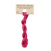 A skein of hot pink embroidery floss, twisted and bundled, with a tan label featuring the brand name and color information.