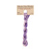 A skein of purple and light pink embroidery floss, twisted and bundled, with a tan label featuring the brand name and color information.