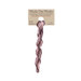 A skein of Variegated Burgundy, Purple, and Light Pink embroidery floss, twisted and bundled, with a tan label featuring the brand name and color information.