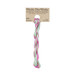 A skein of light green and magenta embroidery floss, twisted and bundled, with a tan label featuring the brand name and color information.