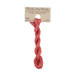 A skein of salmon pink embroidery floss, twisted and bundled, with a tan label featuring the brand name and color information.