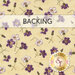 A swatch of cream fabric with tossed purple and lavender flowers with stems. A banner at the top reads "Backing" and a golden Shabby Fabrics logo can be seen in the lower right hand corner.