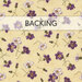 A swatch of cream fabric with tossed purple and lavender flowers with stems. A banner at the top reads "Backing".
