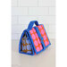Colorful, geometric handbag featuring pink and blue patterns, with a blue handle and zipper detail.