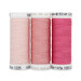 Three spools of thread in pastel pink, light pink, and hot pink arranged side by side on a white background.