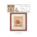The front image of the "Candy Cane Cottage" cross stitch pattern featuring a cottage with candy cane and peppermint details..