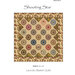 Quilt design titled Shooting Star featuring floral motifs and star patterns on a neutral background.