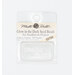 A package of Mill Hill glow in the dark Seed Beads in the color clear glow. 