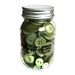 A plastic jar filled with assorted buttons in green, labeled Buttons Galore.