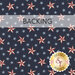 A swatch of navy blue fabric with light blue stars scattered with white and red nautical stars. A banner reads "Backing" and a golden Shabby Fabrics logo rests in the bottom right corner. 