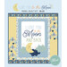 A digital mockup of the completed Love You to the Moon Blue Panel Quilt, a patchwork project with a panel, chevrons, and hearts with a night sky motif, set against a blue background with a text graphic.