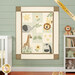 The completed On Safari quilt kit colored in solid fabric and laser cut appliqué, hung on a green paneled wall and surrounded by coordinating décor.